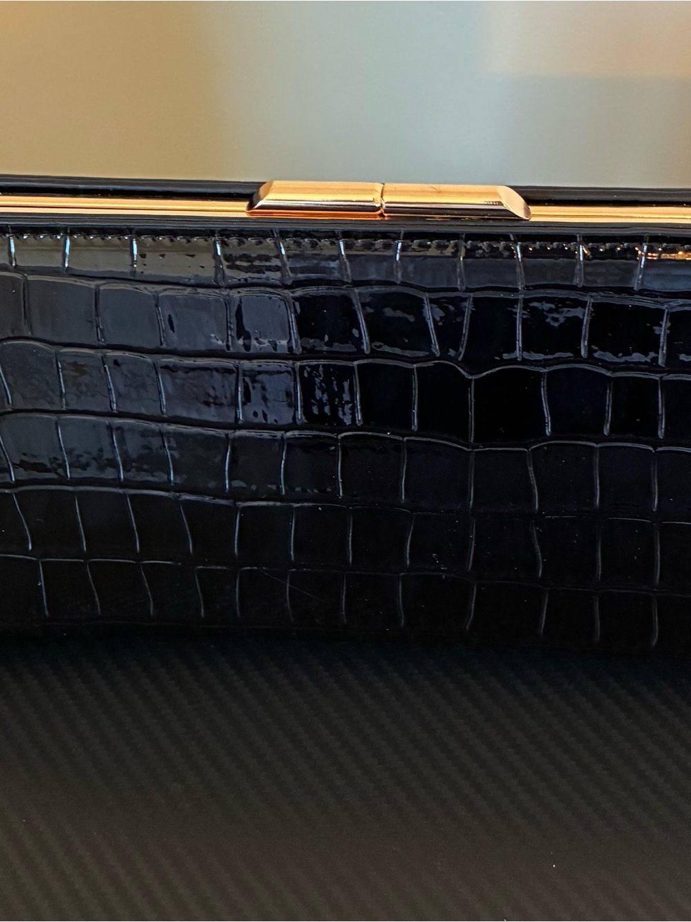 Elegant Black Croc-Embossed Patent Clutch with Gold Frame